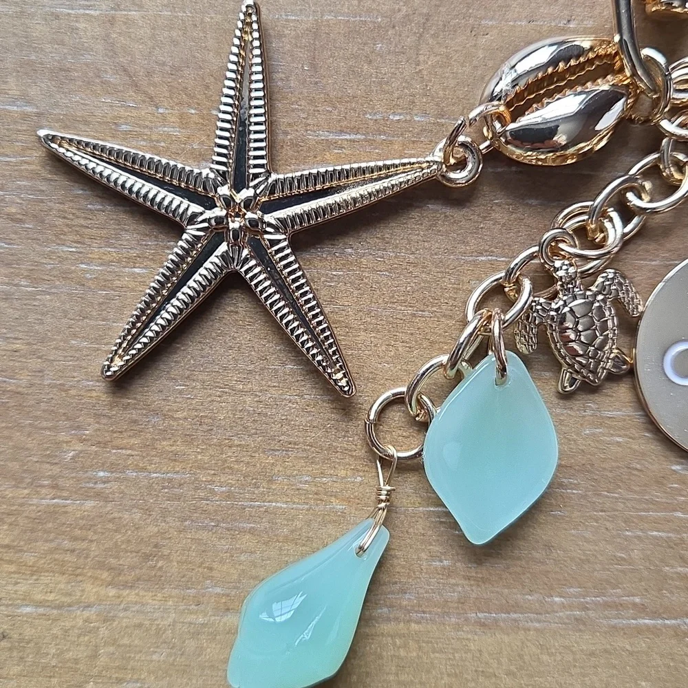 OSEA Malibu Lip Oil Key Chain & Organic Pouch - Picture 5 of 10
